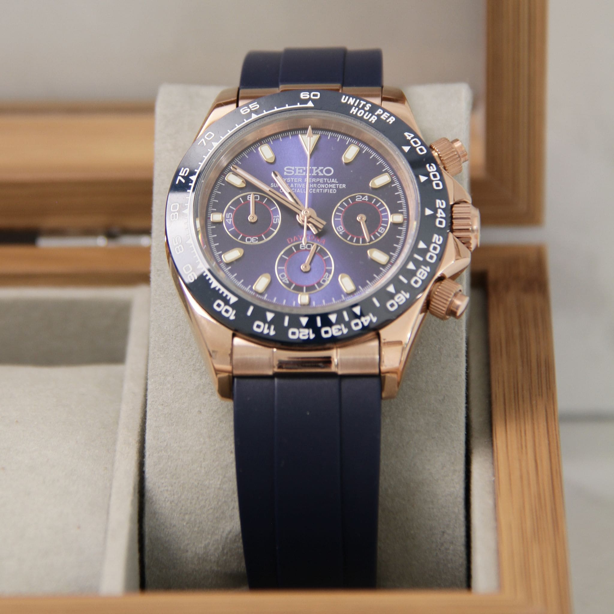 Montre Seiko mod daytona or rose bleu dans boite à montres